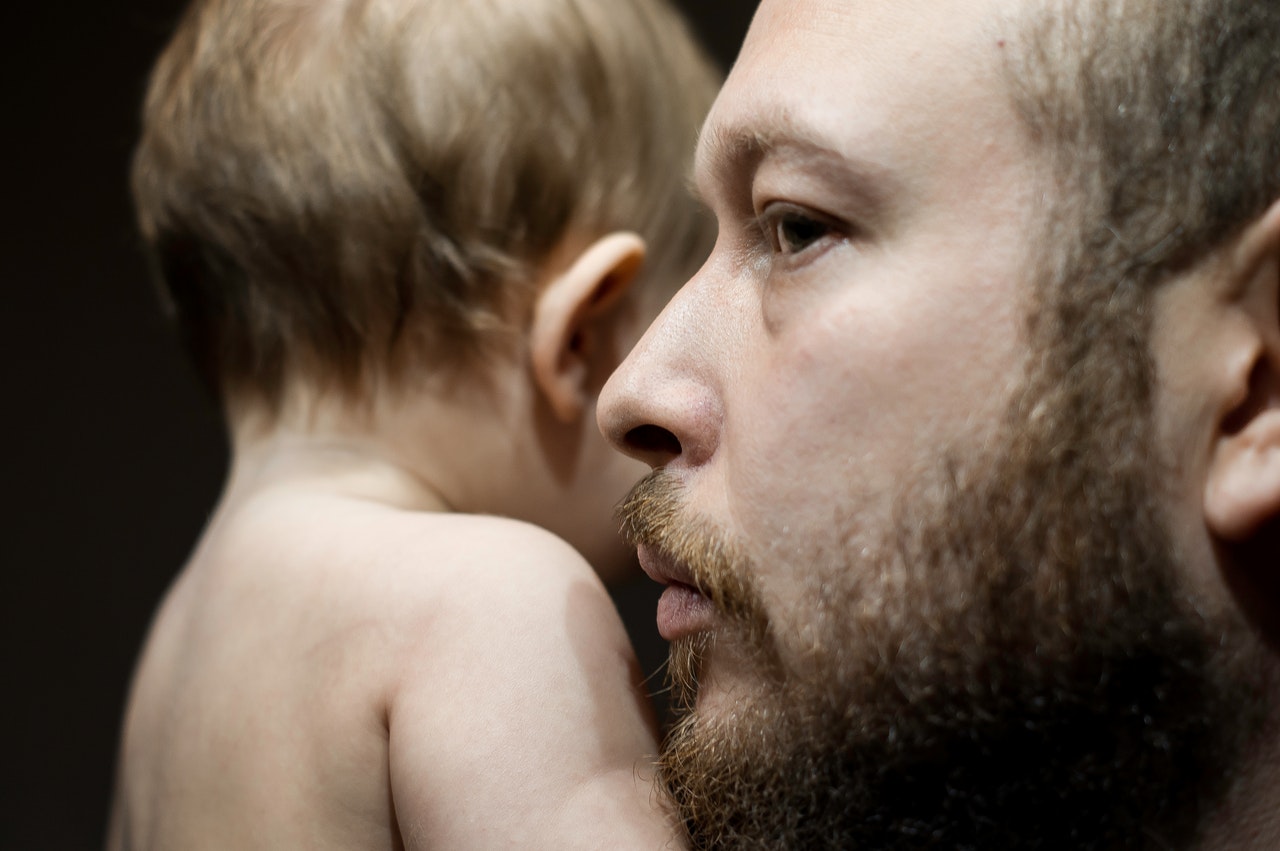dad baby boy solemn